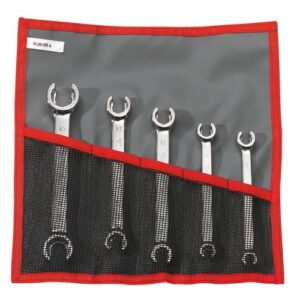 Set of Facom straight flare-nut wrenches with metric sizes in a portable roll-up pouch for automotive and mechanical work.