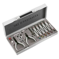 Set of professional grooming scissors and tools in a grey case, ideal for racewear maintenance and detailing, from Grand Prix Racewear.
