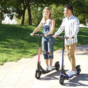 Young couple riding electric scooters in a park, enjoying outdoor fun and fresh air.