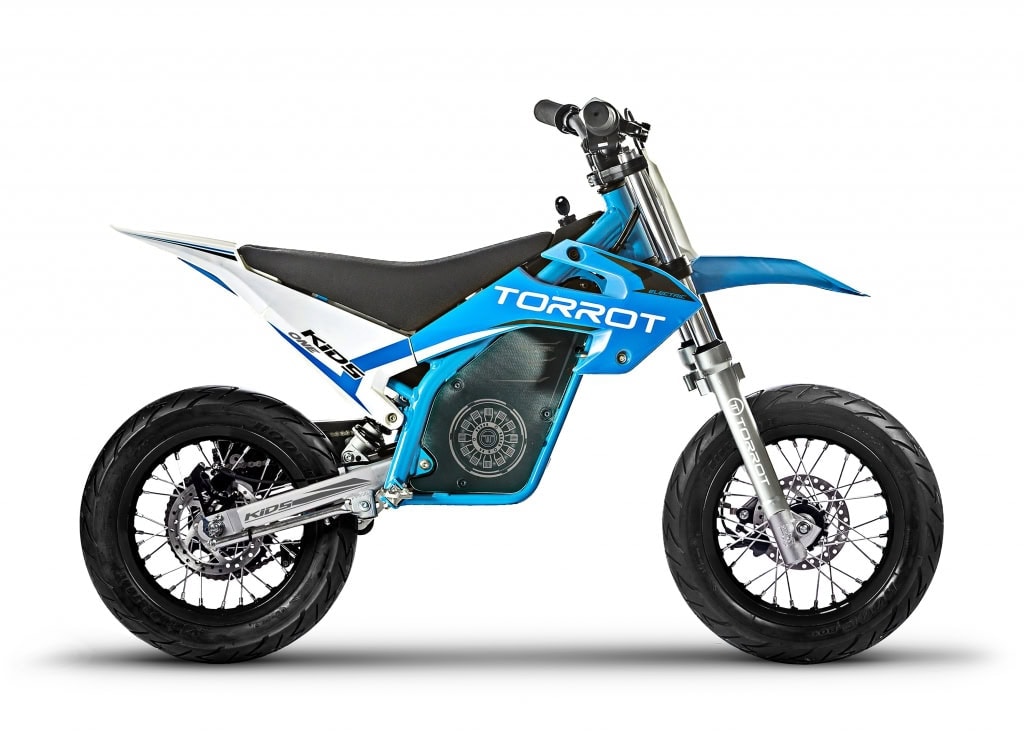Torrot Kids electric dirt bike in blue with black seat and knobby tires, designed for young riders and sustainable outdoor fun.