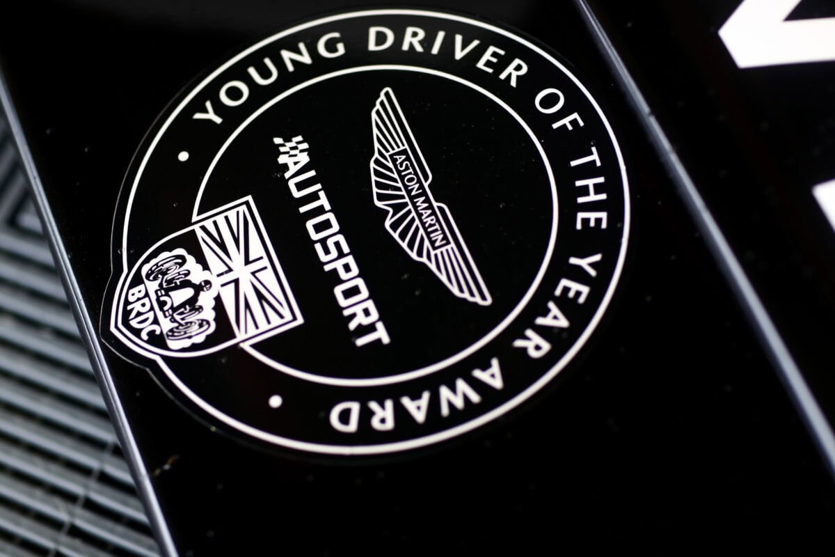 Close-up of the Young Driver of the Year Award 2023 badge featuring Aston Martin and Autosport logos.