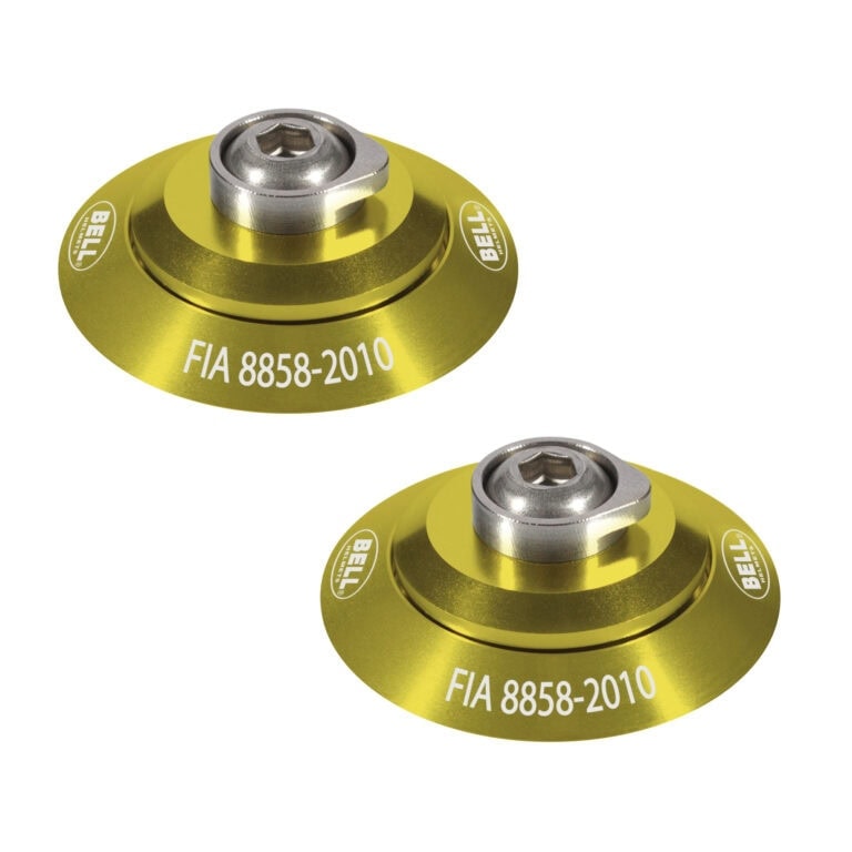 Pair of yellow FIA 8858-2010 racing seat belt buckle adjusters with Bell branding for motorsport safety gear.