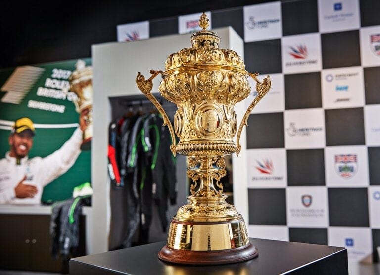 Golden trophy awarded at Silverstone Heritage Museum showcasing motorsport history and racing achievements.
