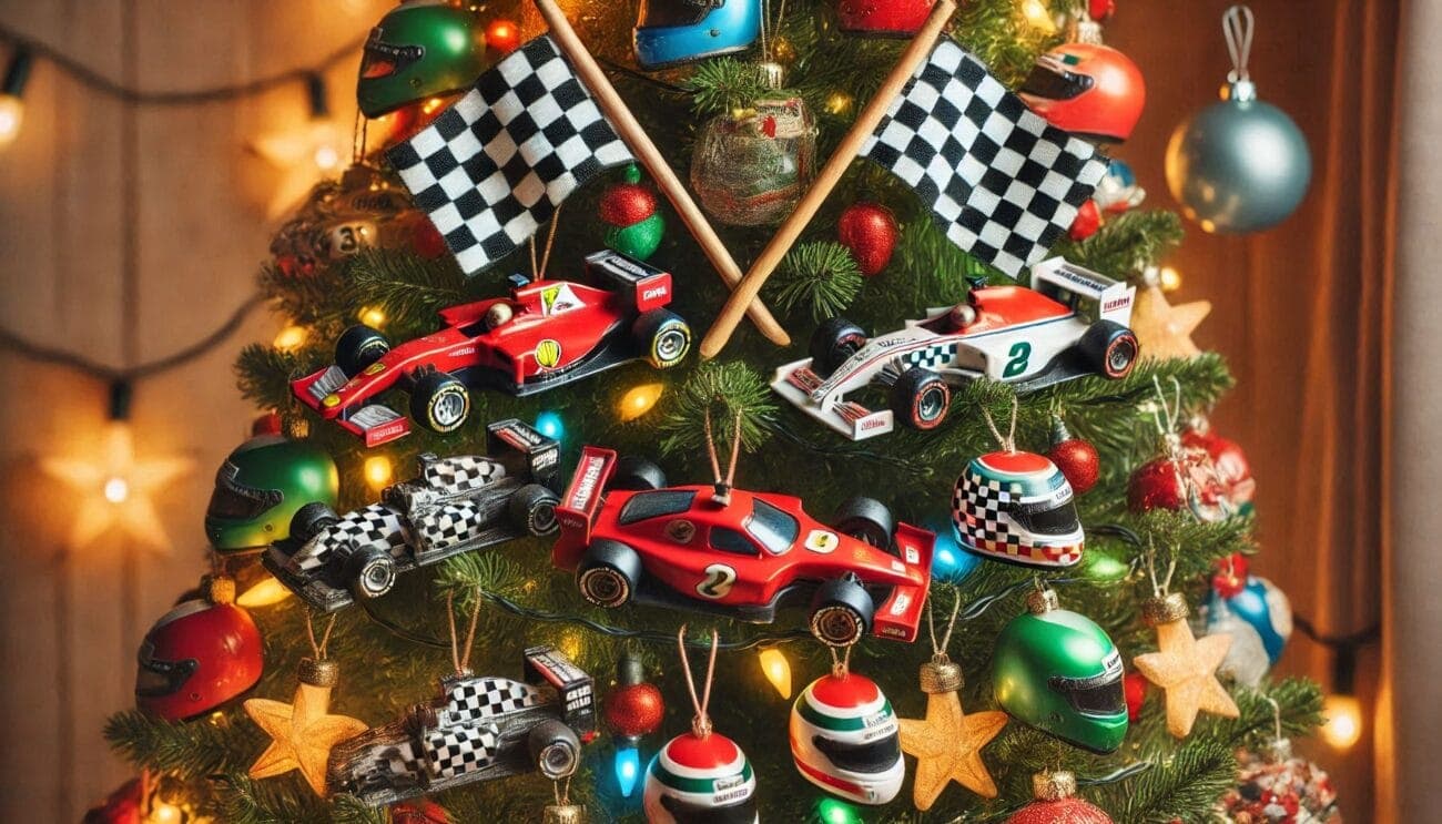 Decorated Christmas tree with miniature Grand Prix race cars, checkered flags, and festive ornaments for holiday racing enthusiasts.