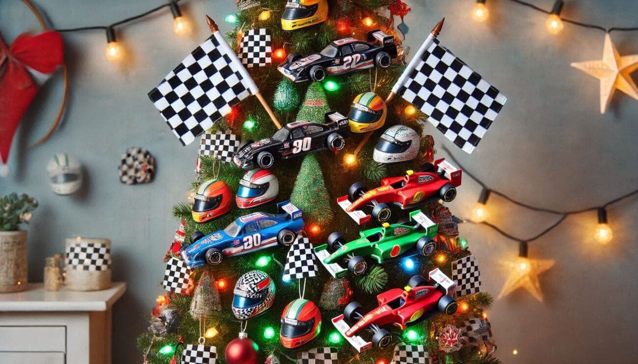 Decorated Christmas tree with racing car ornaments, checkered flags, and string lights for festive motorsport celebration.