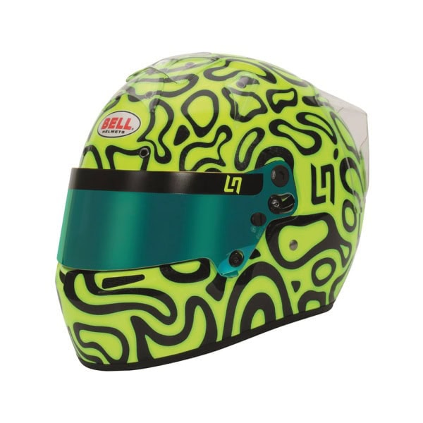 Bright yellow and black patterned Grand Prix racing helmet with Bell logo and green tinted visor for motorsport safety.