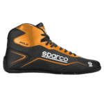 Sparco racing shoe in black and orange with high ankle support, designed for motorsport safety and performance.