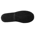 Close-up of a black racing shoe sole with textured grip pattern for motorsport safety and performance.