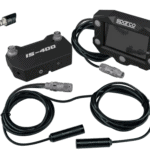 Sparco IS 400 F digital intercom control unit with cables and connectors for race car communication systems.
