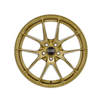 Gold OZ Racing alloy wheel designed for high-performance racing cars, featuring a multi-spoke pattern and lightweight construction.