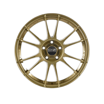 Gold OZ Racing alloy wheel rim designed for high-performance racing cars, featuring a multi-spoke pattern and lightweight construction.