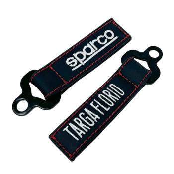 Sparco racing harness tag with 'Targa Florio' branding, used in motorsport safety gear for secure driver restraint.