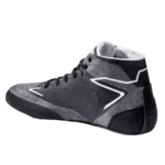 Close-up of a black and grey racing shoe with white accents, designed for motorsport enthusiasts and professional drivers.