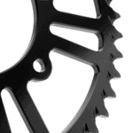 Close-up of a black racing gear component with intricate design, suitable for motorsport racing gear from Grand Prix Racewear.