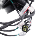 Close-up of racing wiring harness with connectors and cables for Grand Prix Racewear.