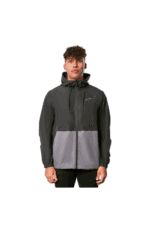 Young man wearing a black and grey Grand Prix Racewear jacket, suitable for motorsport activities.