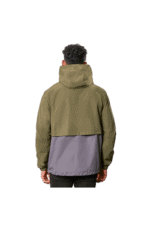 Model wearing Grand Prix Racewear jacket with green and grey design, back view, showcasing racing apparel for motorsport enthusiasts.