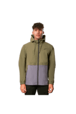 Young man wearing a green and grey Grand Prix Racewear jacket, suitable for motorsport events, with a high collar and zip closure.