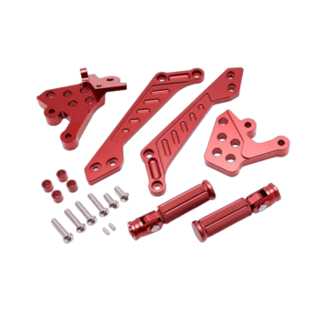 Red aluminium racing parts including brackets, levers, and bolts for Grand Prix racewear and motorsport applications.