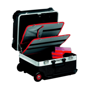 Open black racing equipment case with red-lined compartments and pink boxes inside, suitable for Grand Prix racewear storage.