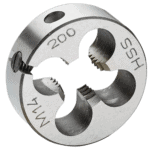 Close-up of Facom 221 split die with engraved specifications, used for precise threading in metalworking.