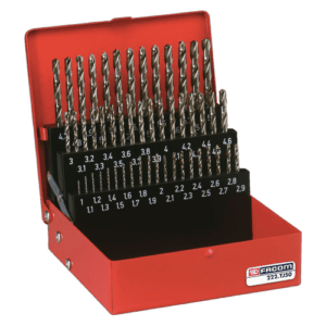 Set of ground twist drills in a red Facom toolbox with sizes ranging from 1.1mm to 6.0mm for precision drilling.