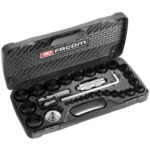 Facom 528-piece industrial maintenance tool set in a black plastic case with various sockets, ratchets, and accessories for professional repairs.