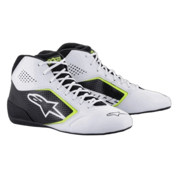 High-performance racing shoes from Grand Prix Racewear with black, white, and neon yellow accents, designed for motorsport enthusiasts.