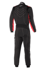 Grand Prix Racewear racing suit in black with red accents, designed for professional motorsport drivers, featuring high-quality materials and advanced safety features.