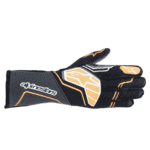Black and gold Alpinestars racing glove with protective padding and grip details, designed for motorsport safety and performance.