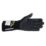 Black racing glove with yellow logo and protective padding, designed for motorsport safety and performance.