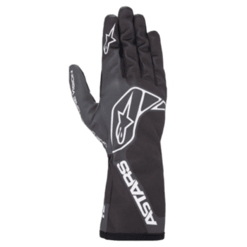 Black Alpinestars racing glove with white logo and branding, designed for motorsport safety and performance.