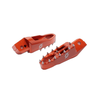 Red Grand Prix racing footpegs with metal spikes for motorcycle racing, designed for grip and stability.