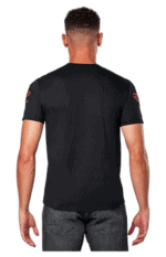 Back view of a man wearing a black Grand Prix Racewear T-shirt, showcasing racing apparel for motorsport enthusiasts.