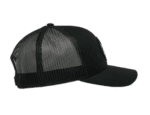 Black mesh and fabric trucker cap with curved brim, suitable for casual and motorsport wear.