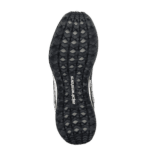 Close-up of a black Alpinestars racing shoe sole with rugged tread pattern for grip and durability.