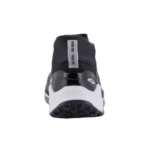 Close-up of a black and white Grand Prix Racewear racing shoe with a sleek design and grip sole, ideal for motorsport enthusiasts.