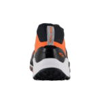Close-up of a Grand Prix Racewear racing shoe in black, orange, and white with grip sole for motorsport safety.