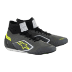 Black and grey racing shoes with yellow accents from Grand Prix Racewear, designed for motorsport enthusiasts.
