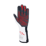 Alpinestars racing glove designed for motorsport, featuring red, black, and white colours with protective padding and grip enhancements.