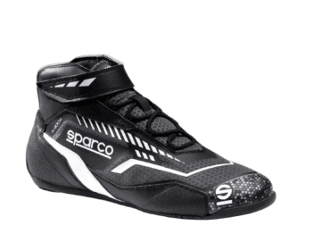 Black and white Sparco racing shoe with high ankle support and Velcro strap, designed for motorsport safety and performance.