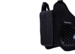 Close-up of a black Grand Prix Racewear racing mask with honeycomb ventilation and adjustable strap for motorsport safety.