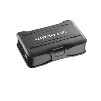 Compact black GPS device with 'GPROM' branding for race car navigation and telemetry at Grand Prix events.