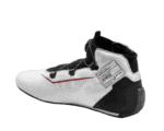Close-up of a Sparco racing shoe with white, black, and red details, designed for motorsport drivers.