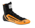 High-performance racing shoe from Grand Prix Racewear, featuring black and orange design with advanced grip and support for motorsport drivers.