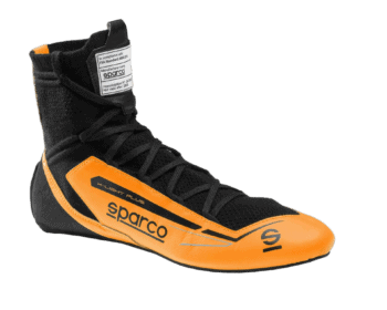 High-performance racing shoe from Grand Prix Racewear, featuring black and orange design with advanced grip and support for motorsport drivers.