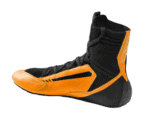 High-performance Grand Prix racing shoe in black and orange with advanced grip and support for motorsport drivers.