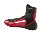 High-performance Grand Prix racing shoe with red and black design, featuring advanced grip and ankle support for motorsport drivers.