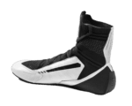 High-performance Grand Prix racing shoe in black and white with advanced grip and support for motorsport drivers.