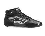 Black Sparco racing shoe with white and grey accents, designed for motorsport safety and performance.